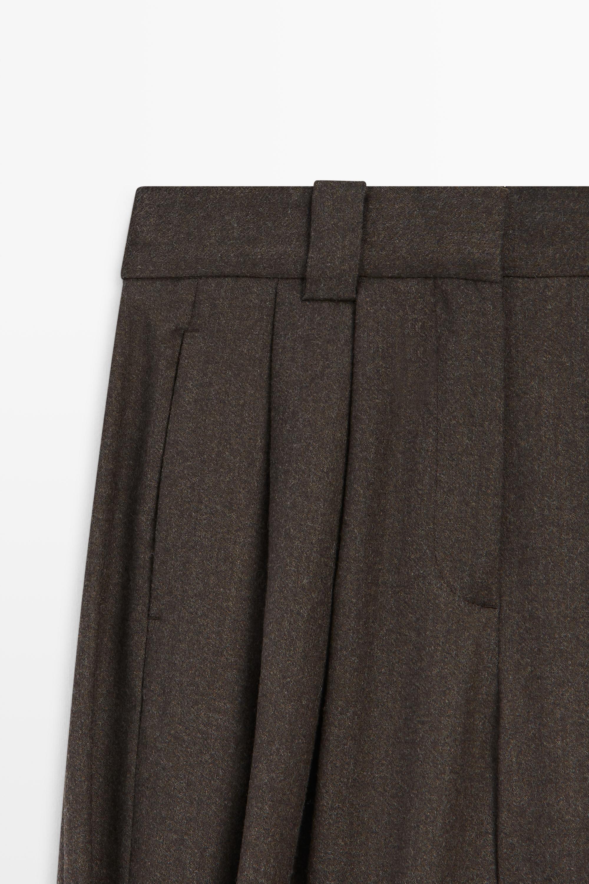 Pleated flannel trousers with hem detail